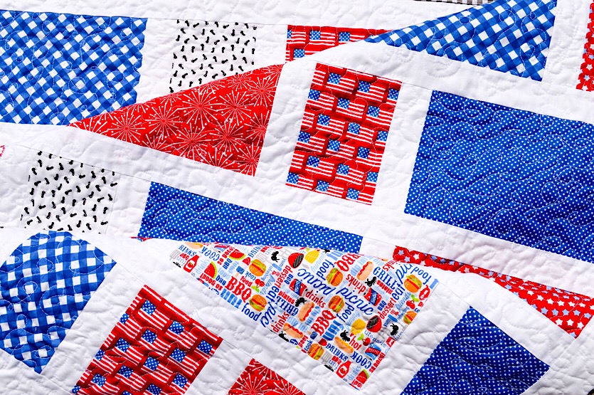 red, white and blue picnic quilt