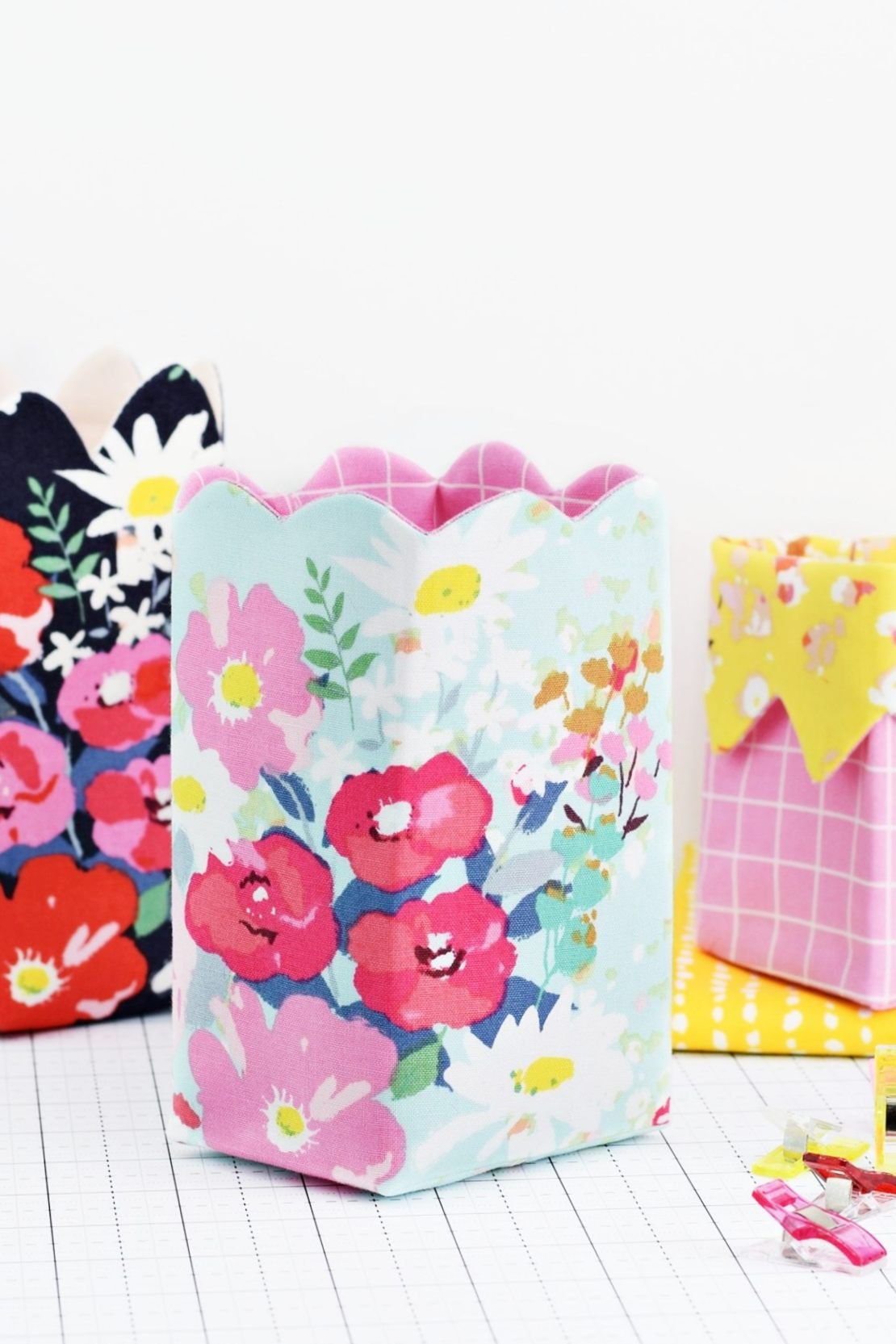 small fabric bins in floral prints