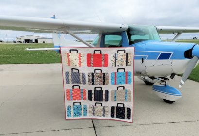Suitcases quilt made with Pan Am fabrics from Riley Blake