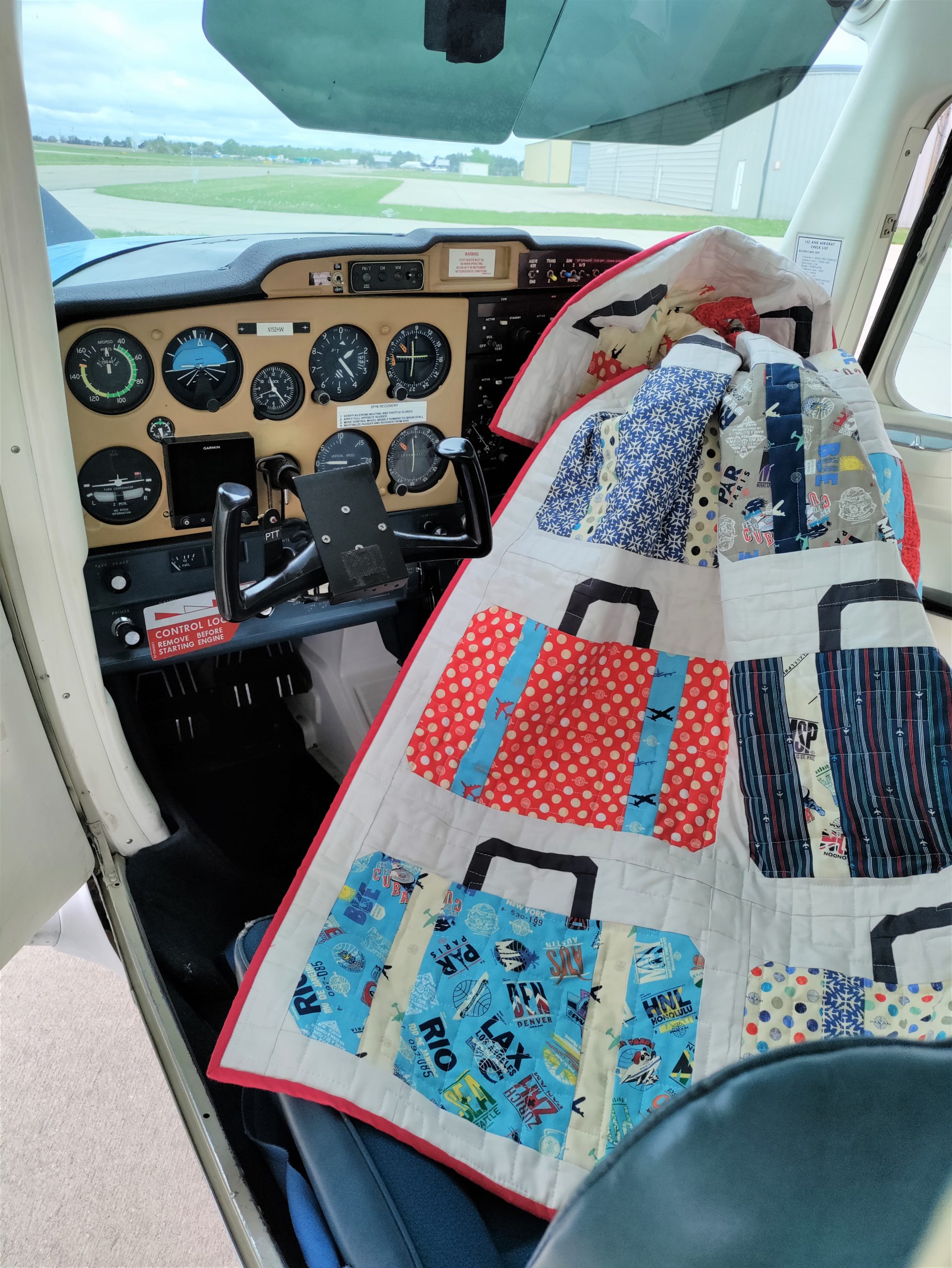 Suitcases quilt made with Pan Am fabrics from Riley Blake