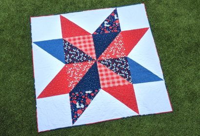 Red, white, and blue giant star quilt made with the Land of the Brave fabric collection
